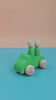 Extrokids Wooden 1 Car With 2 Peg Doll Set Toy - 1 pc RANDOM COLOR WILL BE SHIPPED - EKT1923