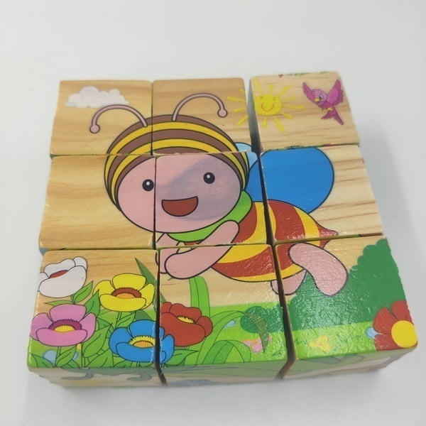 9-Piece Wooden Cube Puzzle (One Random Design Shipped)